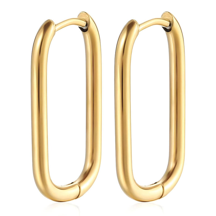Gold hoop earrings on a white background