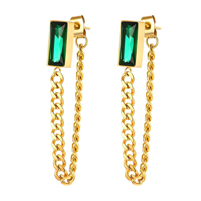 Gold chain earrings with green gemstones on a white background