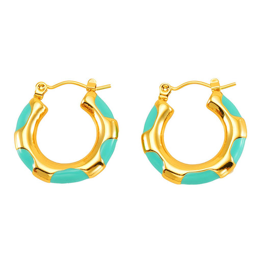Gold hoop earrings with turquoise enamel on a white background