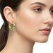 Gold hoop earrings with turquoise enamel on a white background