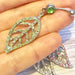 Large Gem Paved Leaf Belly Bar 14G
