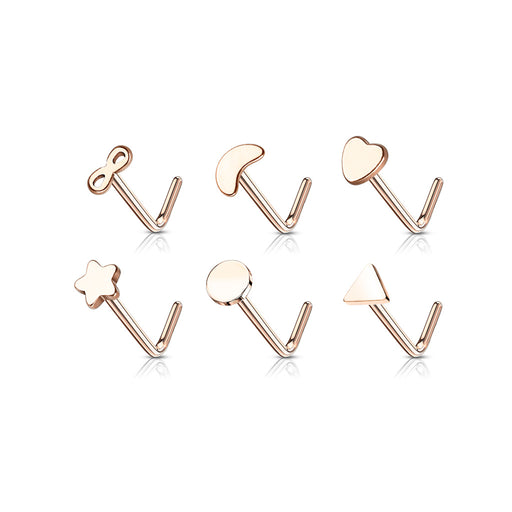Set of rose gold nose rings with various shapes on a white background