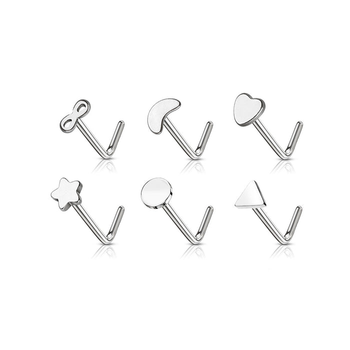 Set of silver nose rings with various shapes on a white background