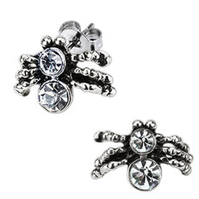 Silver-toned spider-shaped stud earrings with clear rhinestones, shown on a white background with a black post icon and the word 'Post' in the top right.