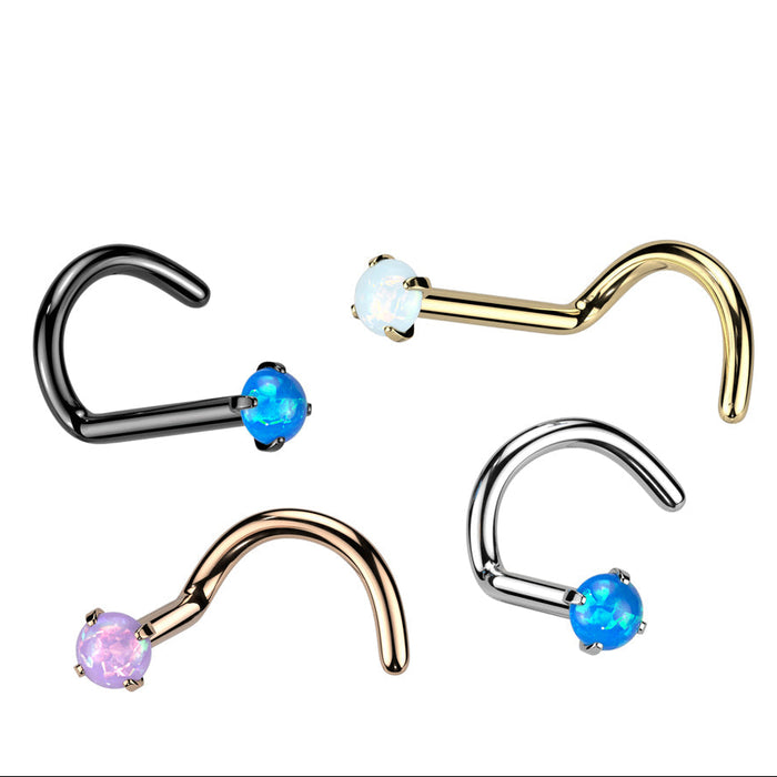 Set of nose rings with gemstones on a white background