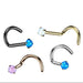 Set of nose rings with gemstones on a white background
