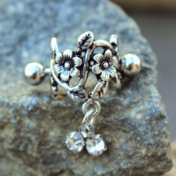 Flower Vine Cartilage Cuff – Antique Floral Stainless Steel Ear Cuff with Clear CZ Dangles on rock display